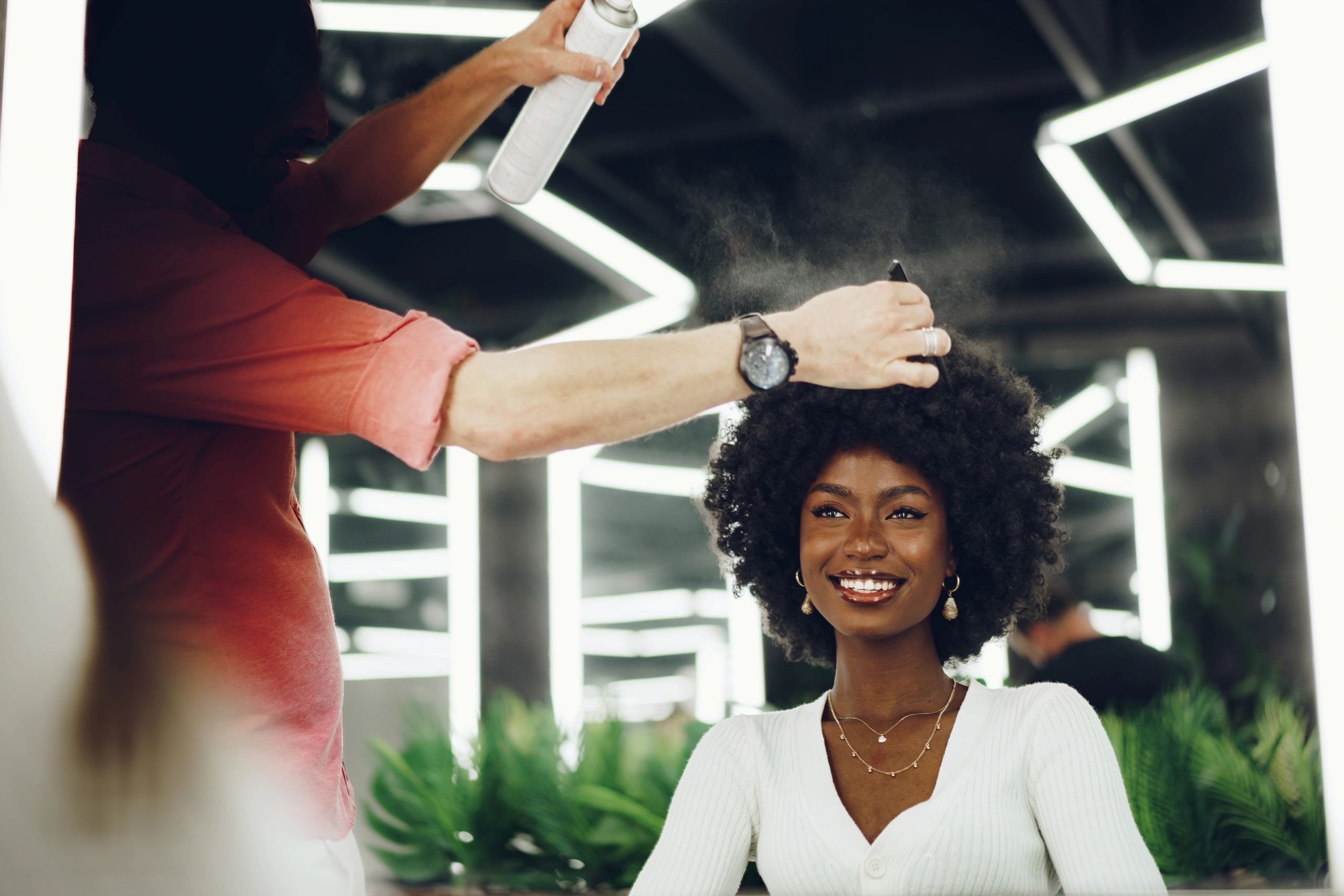 Young woman getting a trendy hairstyle