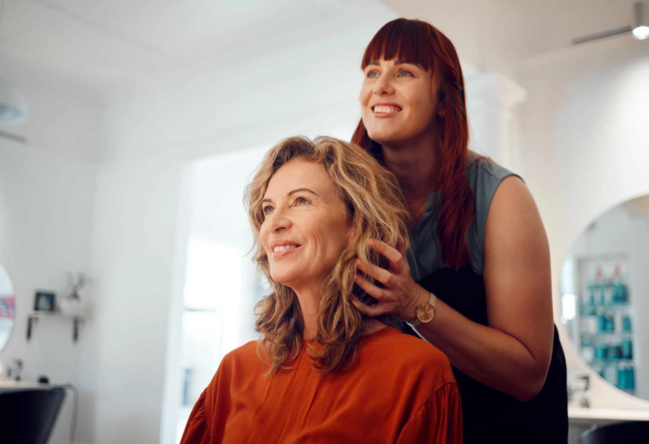 Consultation between stylist and senior client